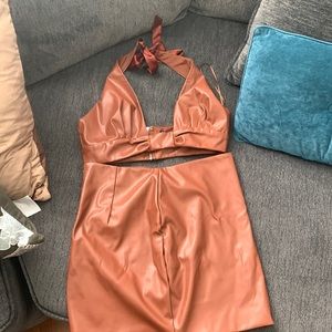 A two piece skirt and top from fashion nova . It has never been worn !!